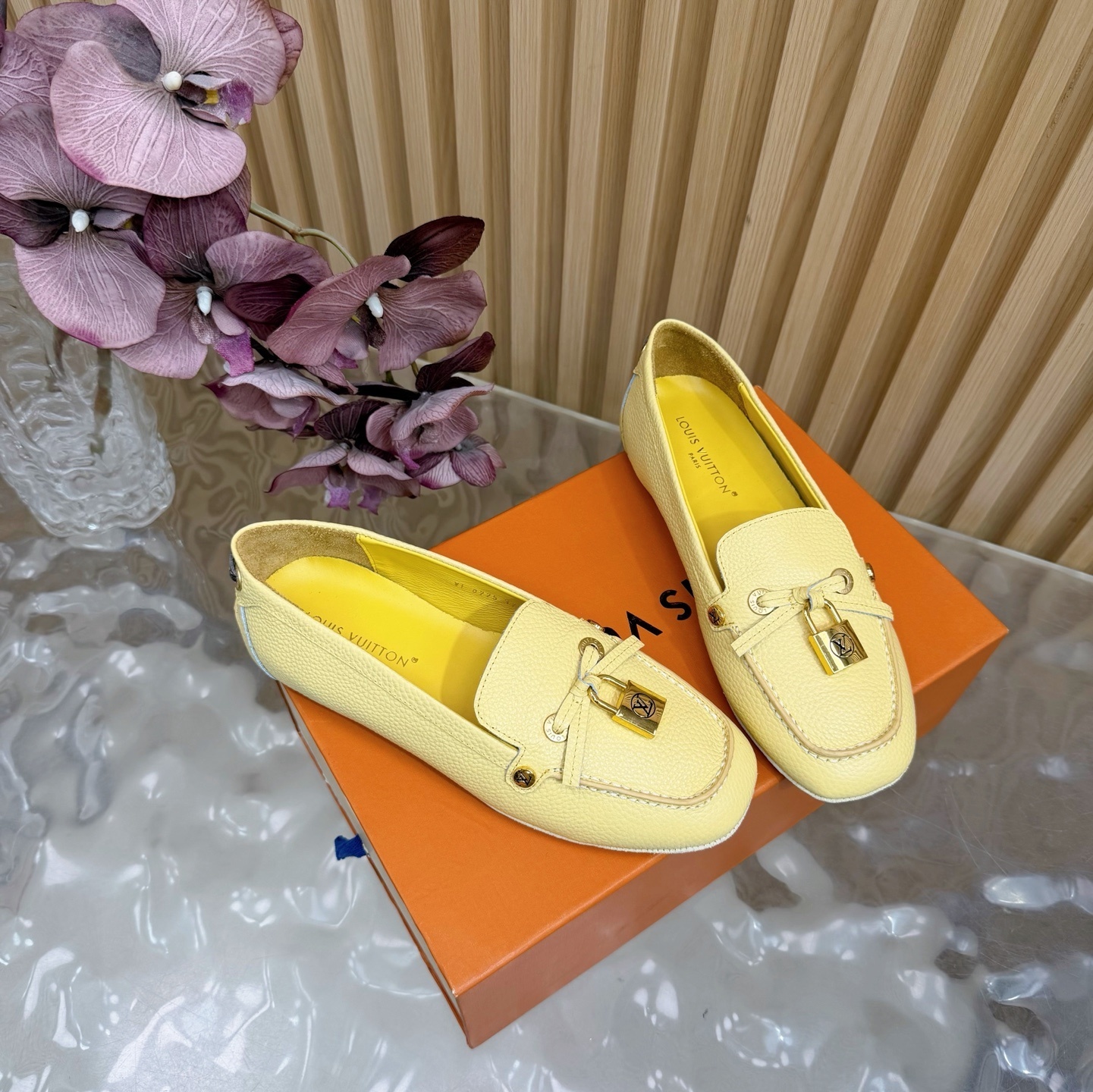 Louis Vuitton Women's Pale Yellow Grained Leather Loafers