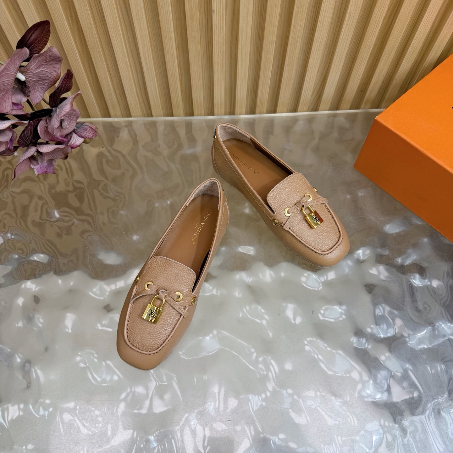 Louis Vuitton Gloria Flat Loafers in Beige Grained Leather