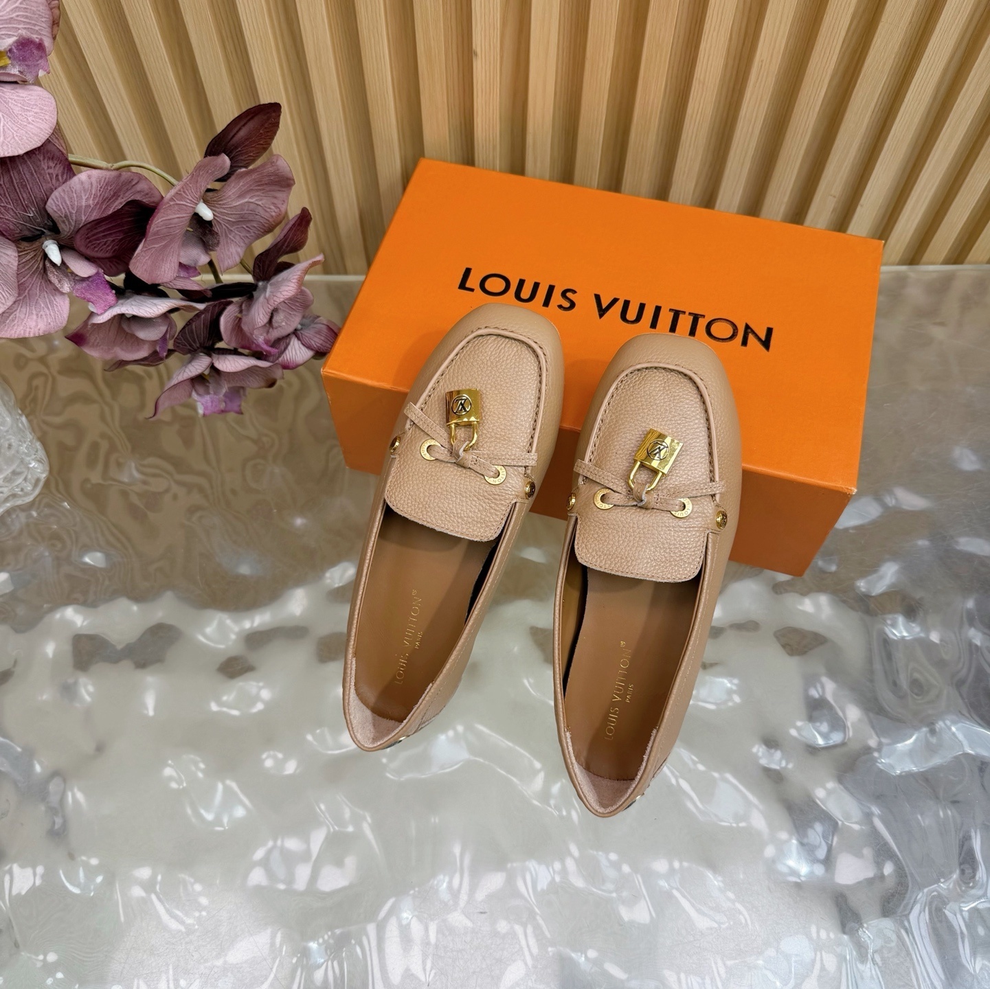 Louis Vuitton Gloria Flat Loafers in Beige Grained Leather