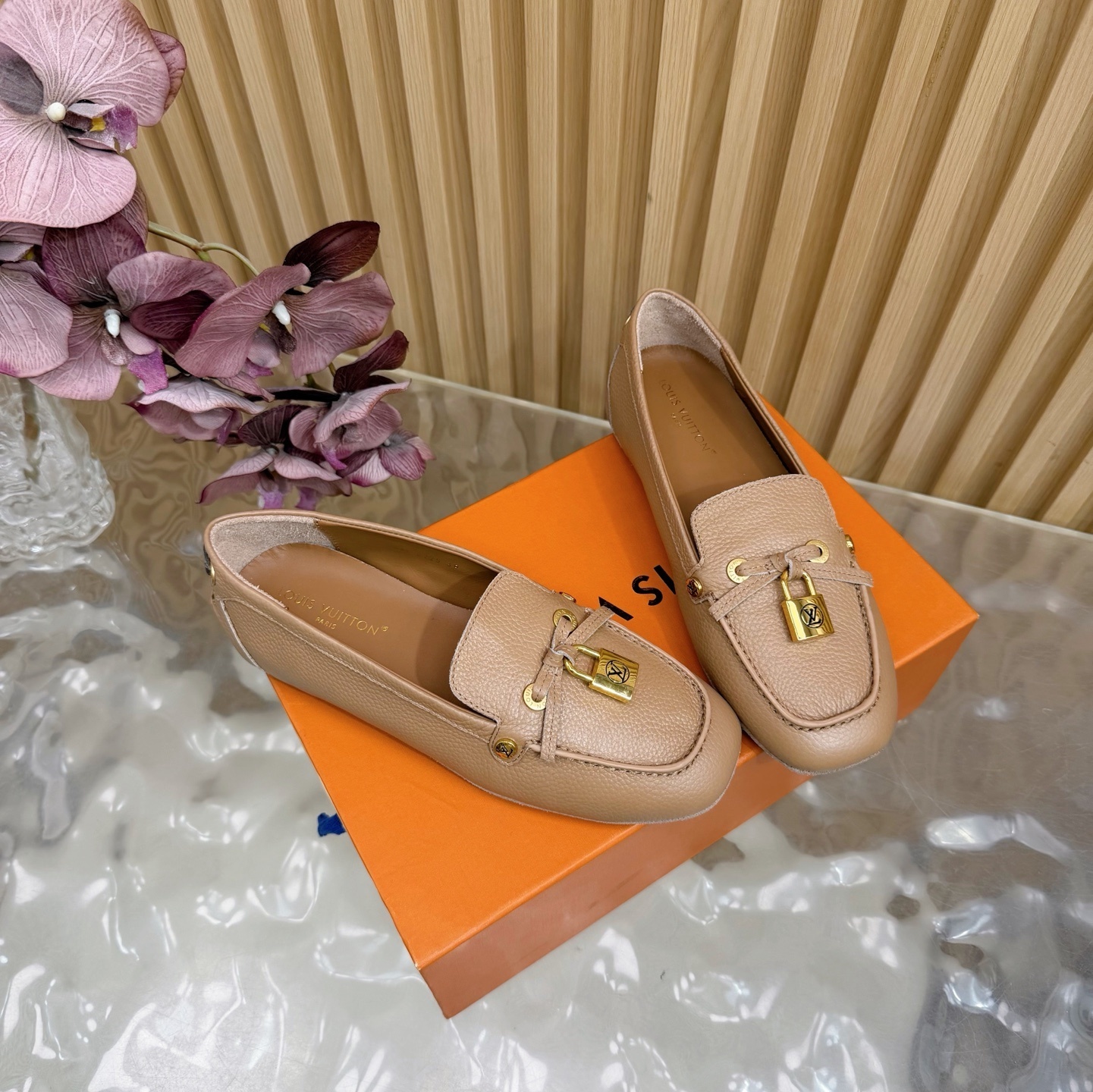 Louis Vuitton Gloria Flat Loafers in Beige Grained Leather