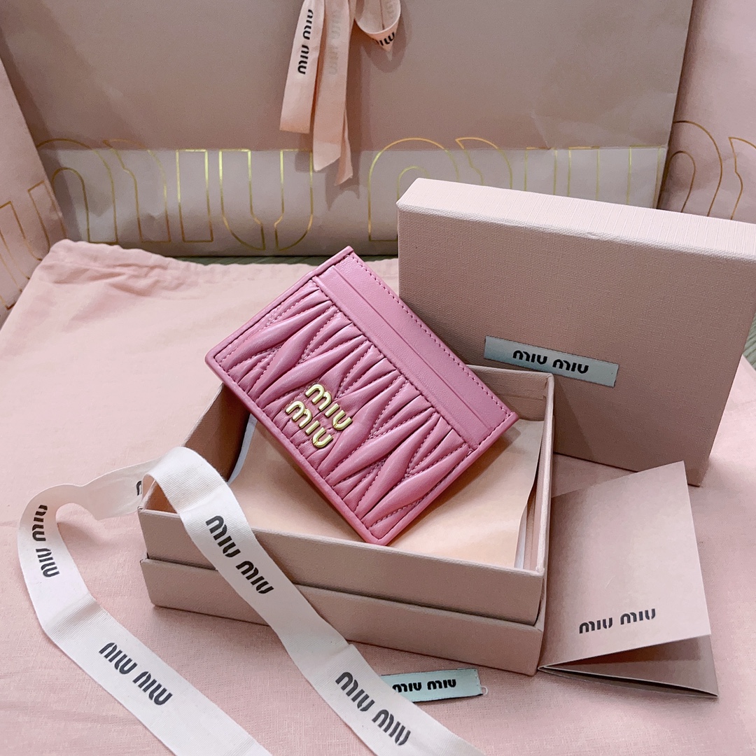 Logo matelassé leather card holder in pink - Miu Miu