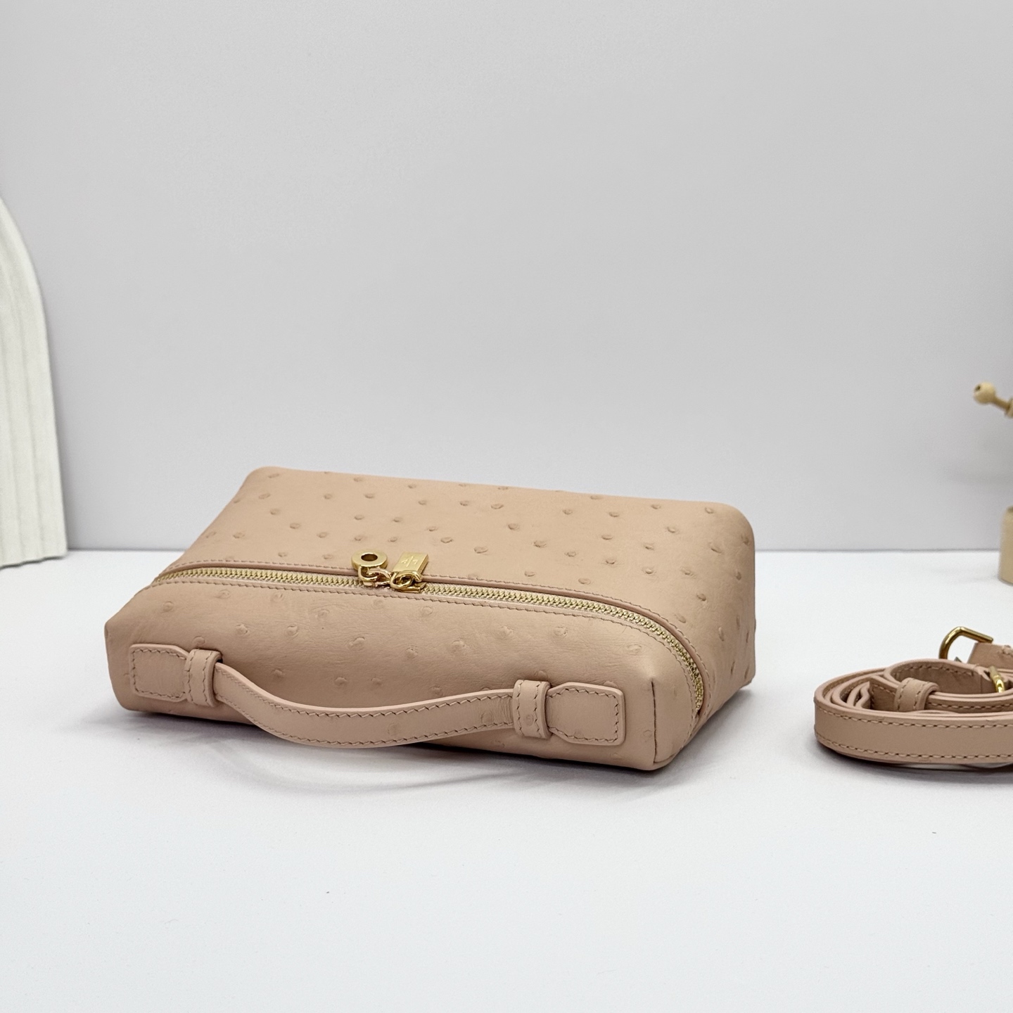 Loro Piana Extra Pocket Charm Ostrich Leather Oryx beige| Loro Piana US