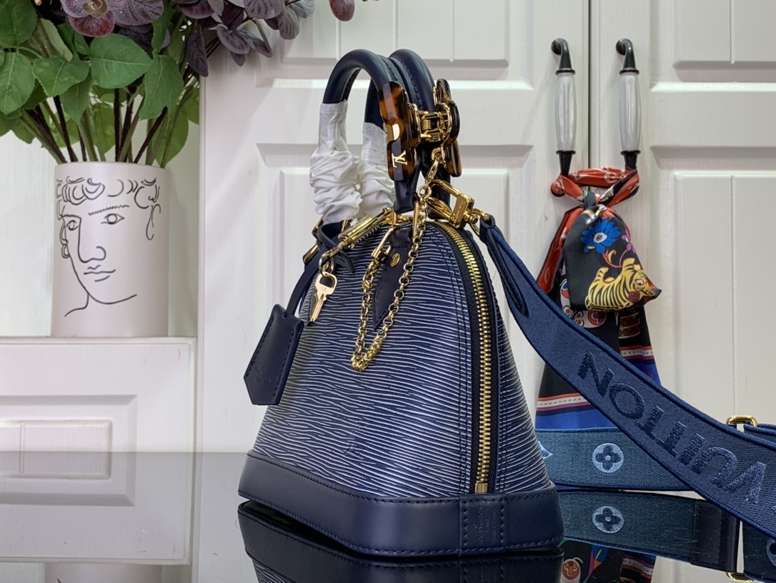 LOUIS VUITTON Alma BB Epi Leather Blue