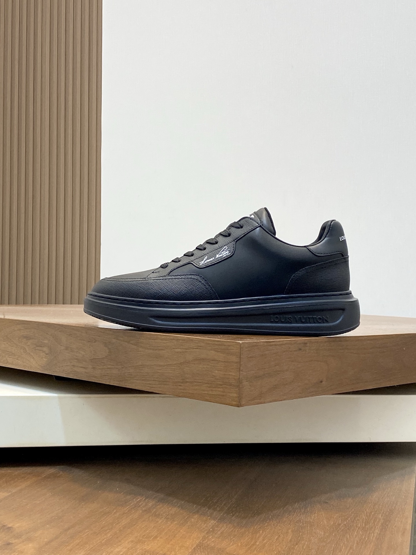 Louis Vuitton Black and White Calf Leather Beverly Hills Description:  Made from smooth calf leather in timeless black and white tones  Features iconic LV logo on the tongue for a bold signature style  Sleek low-top design with precise stitching for a refined finish  Soft leather lining and cushioned insole ensure lasting comfort  Durable rubber outsole provides excellent traction and supportSneakers