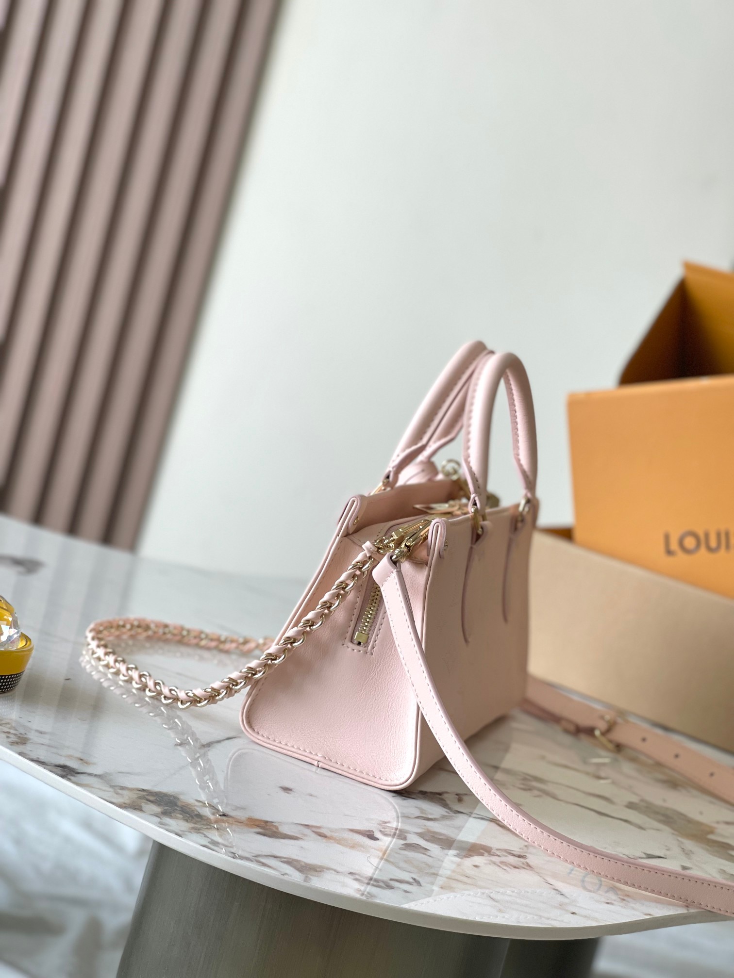 LOUIS VUITTON Calfskin OnTheGo East West Pearl Pink