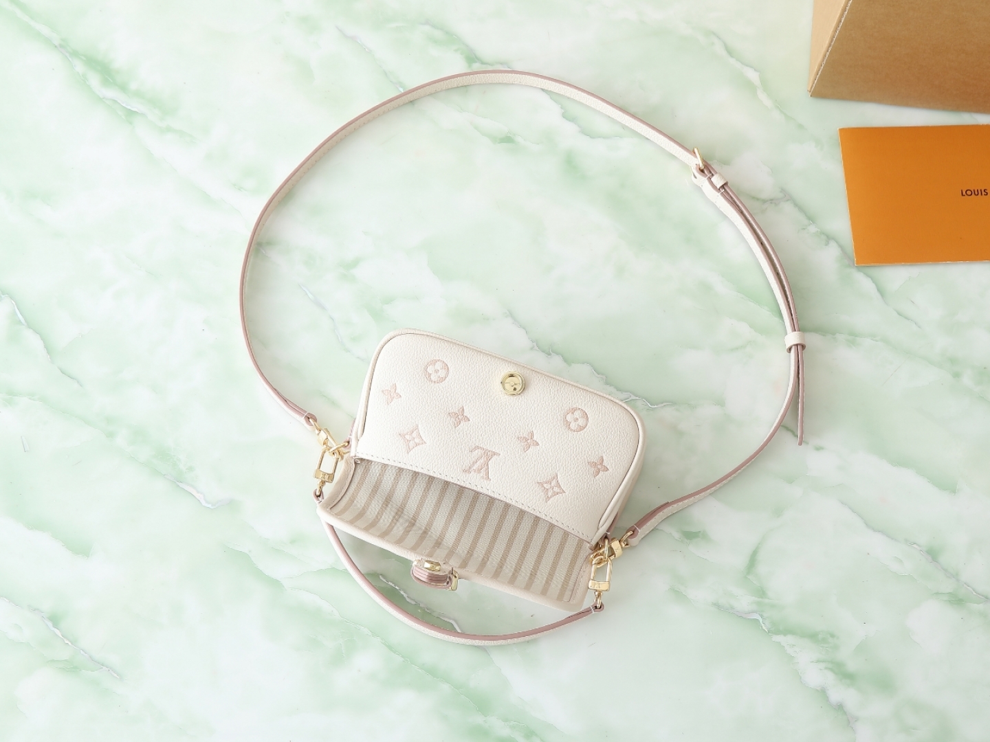 LOUIS VUITTON Diane Monogram Empreinte Nano Bag White