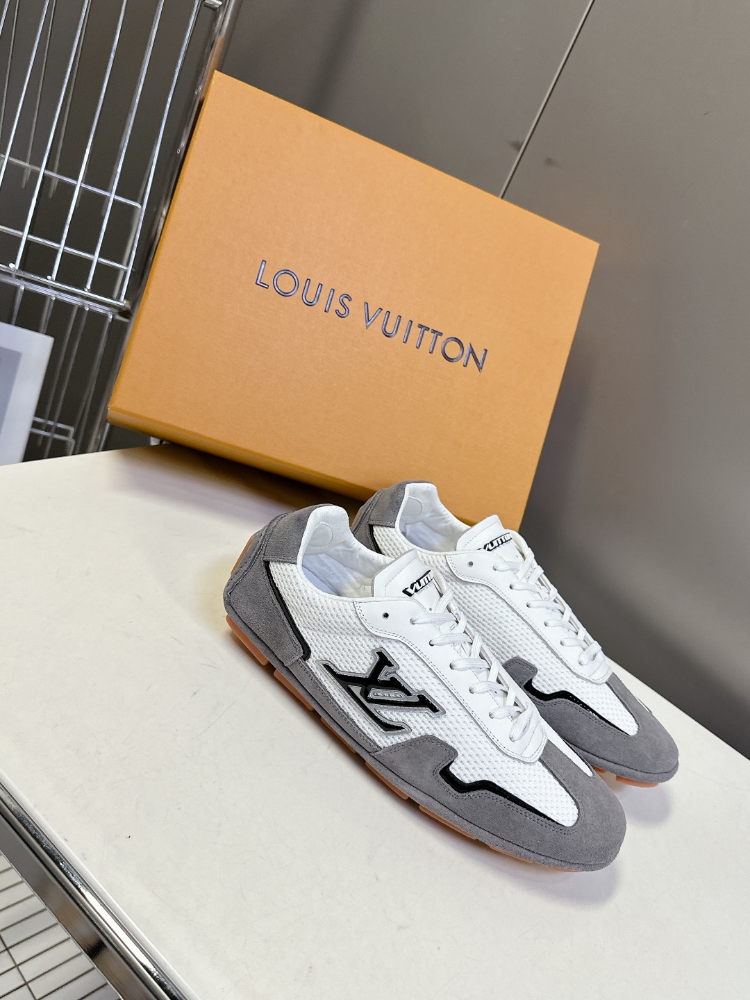 Louis Vuitton Gray & White Suede Sneakers â€“ Timeless Street-Luxe Style