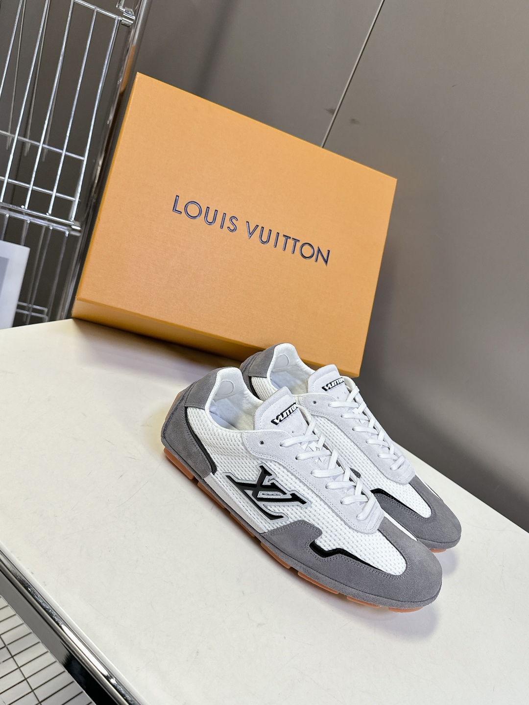 Louis Vuitton Gray & White Suede Sneakers â€“ Timeless Street-Luxe Style
