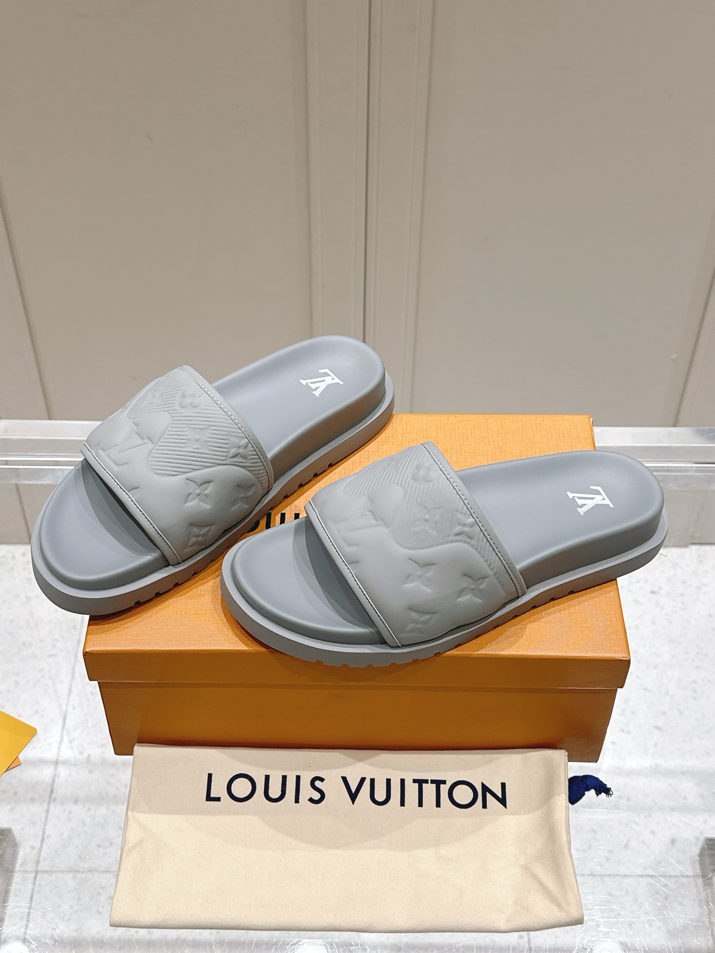 Louis Vuitton Gray Embossed Leather Slide Sandals