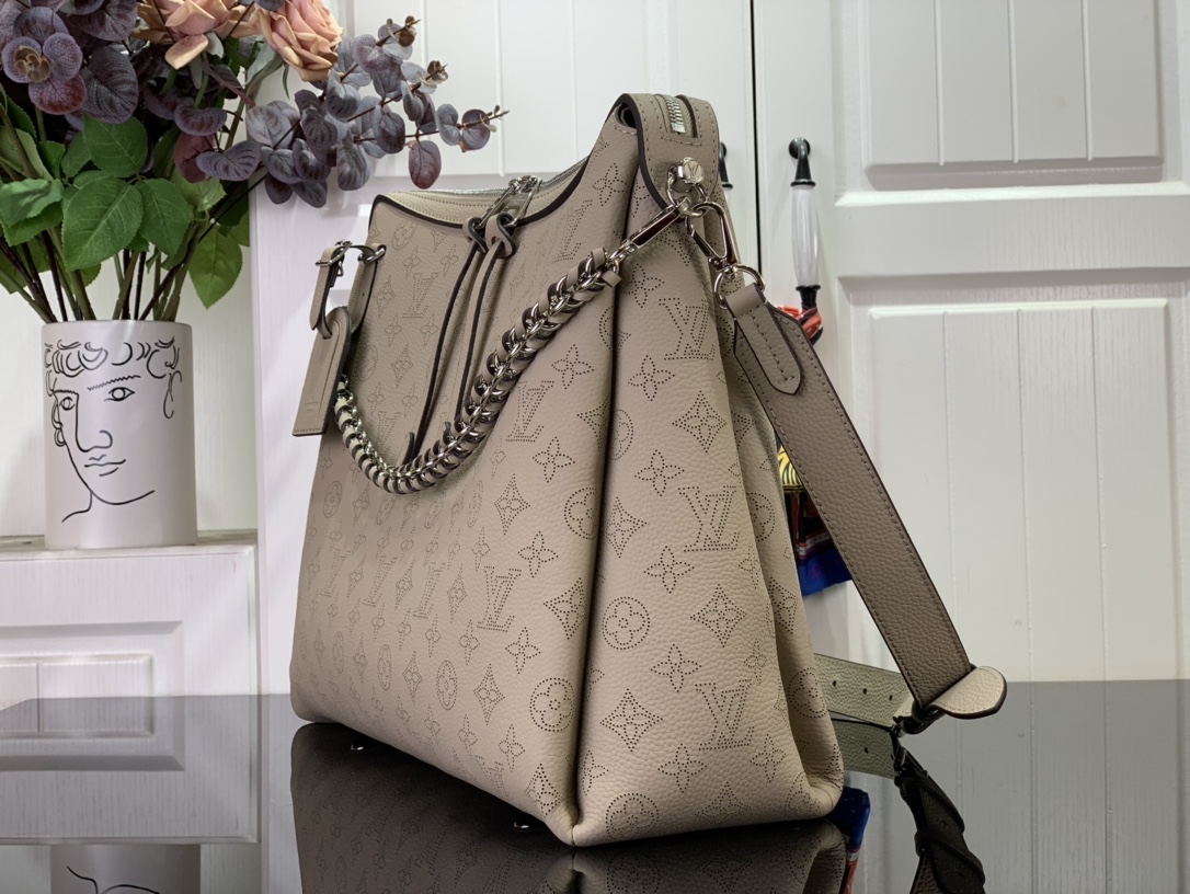 Louis Vuitton Hand It All MM Mahina - Women - Handbags | LOUIS VUITTON