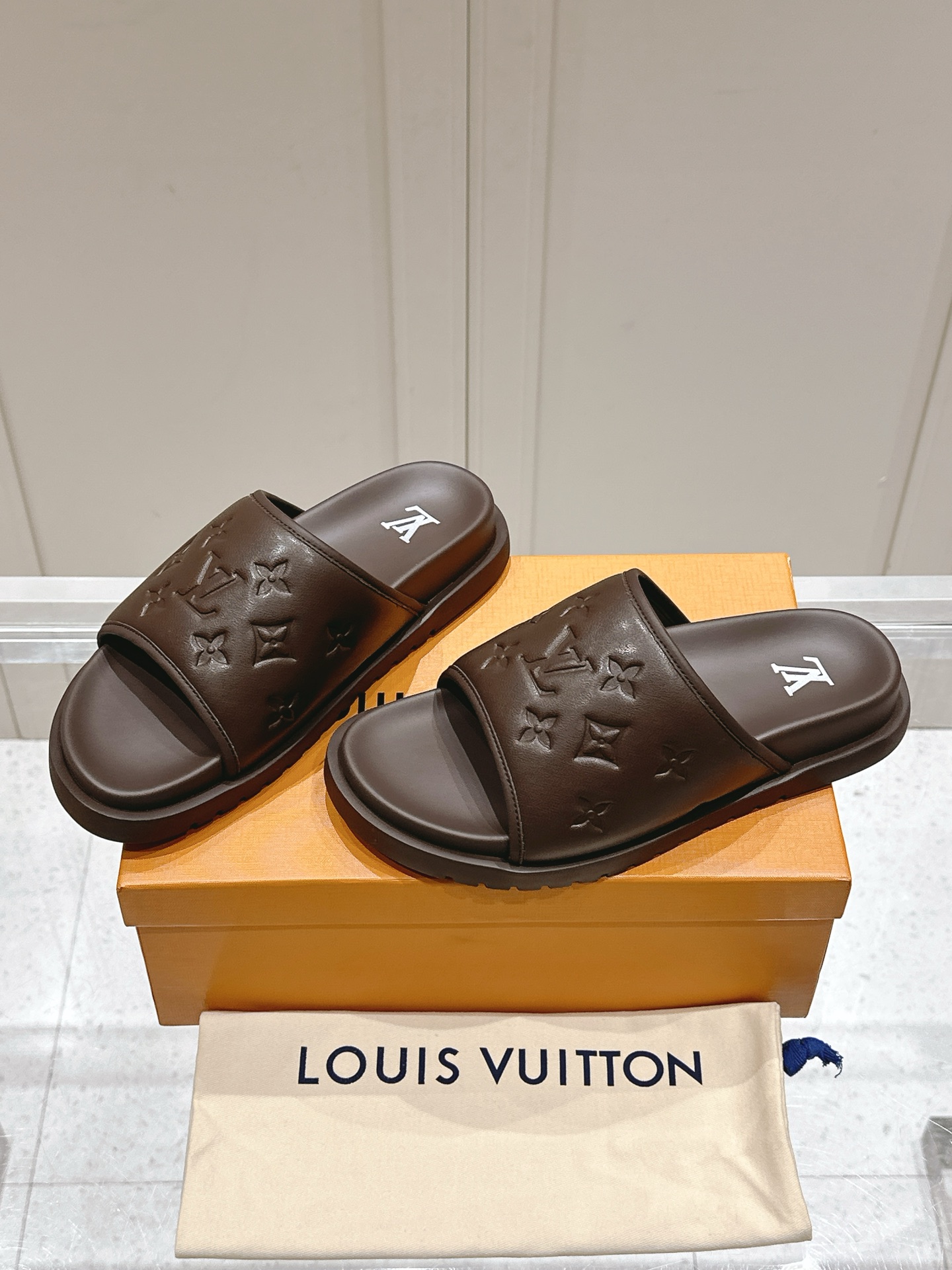 Louis Vuitton Menâ€™s Brown Slide Sandals Monogram Embossed Pattern Rubber Sole Slip On
