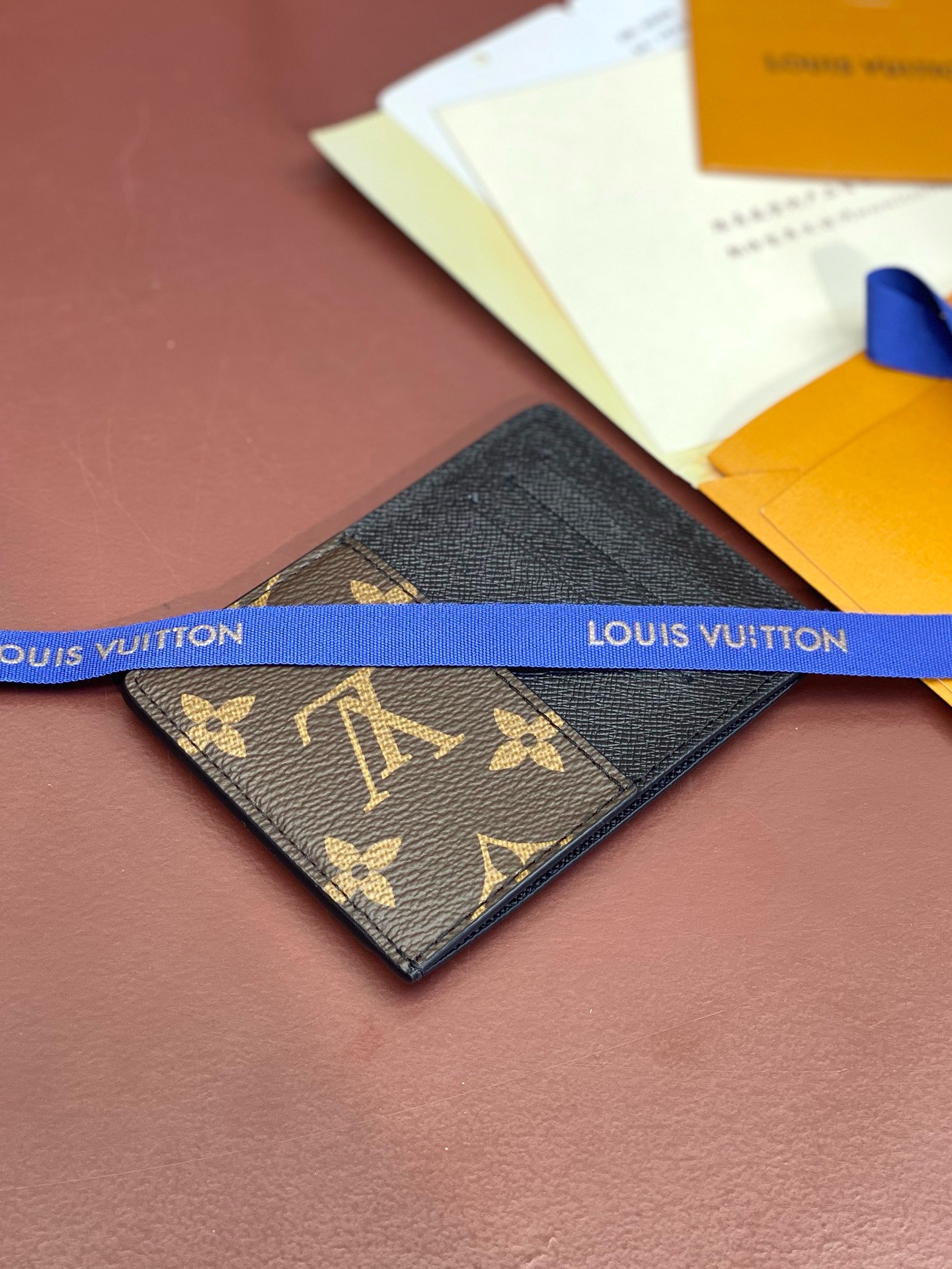Louis Vuitton men’s wallet with brown floral card holder