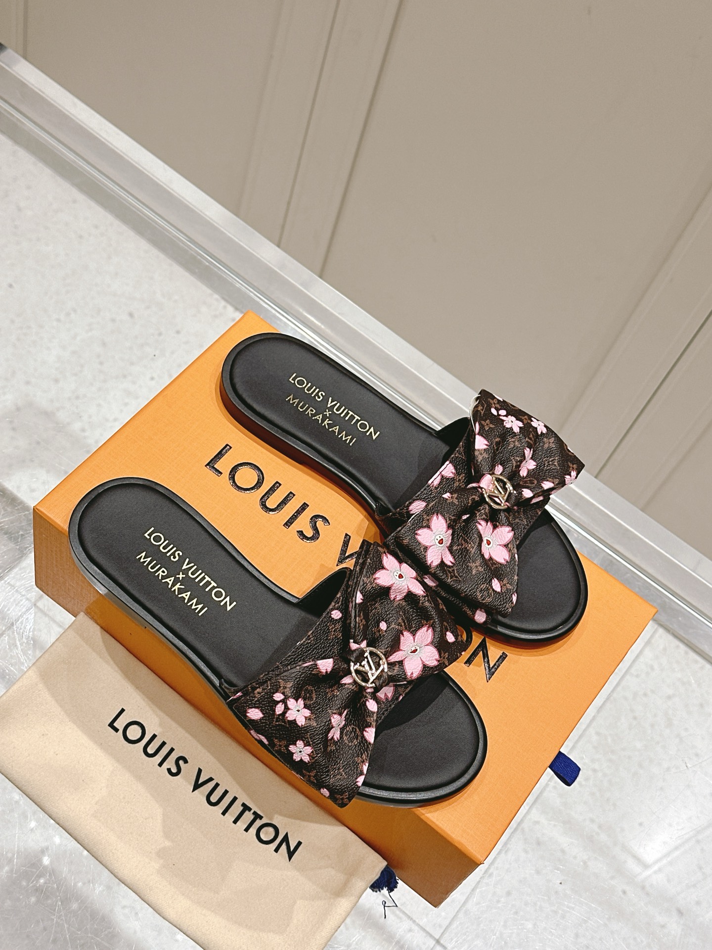 Louis Vuitton Monogram Bow Slides