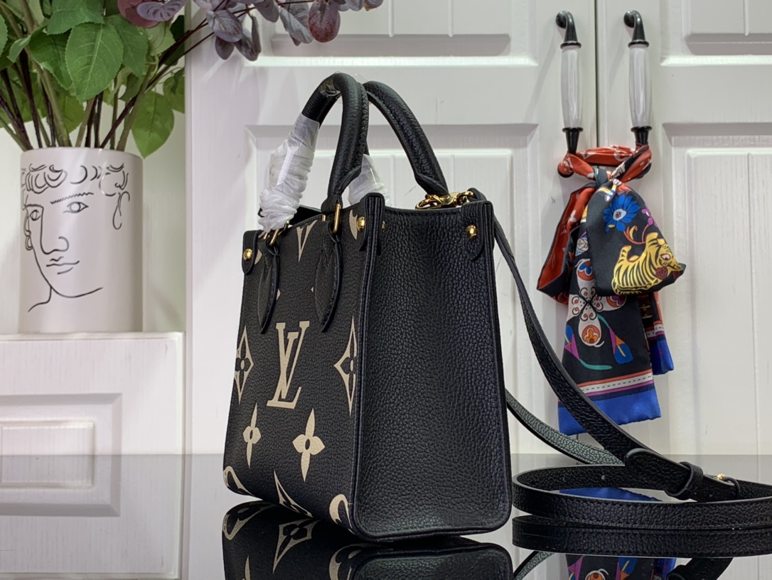 LOUIS VUITTON Monogram Empreinte Bicolor On The Go