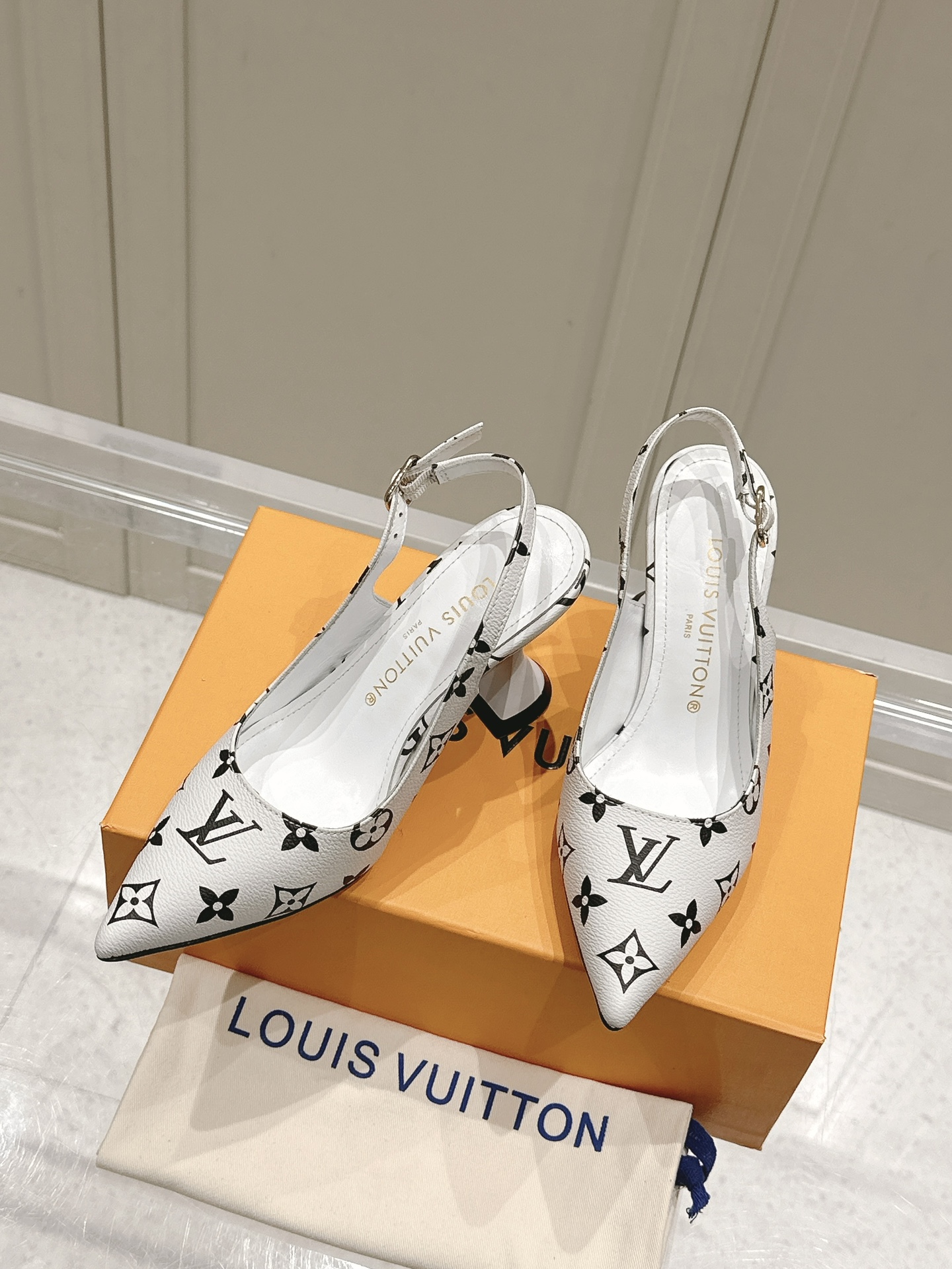 Louis Vuitton Monogram Slingback Pumps in White
