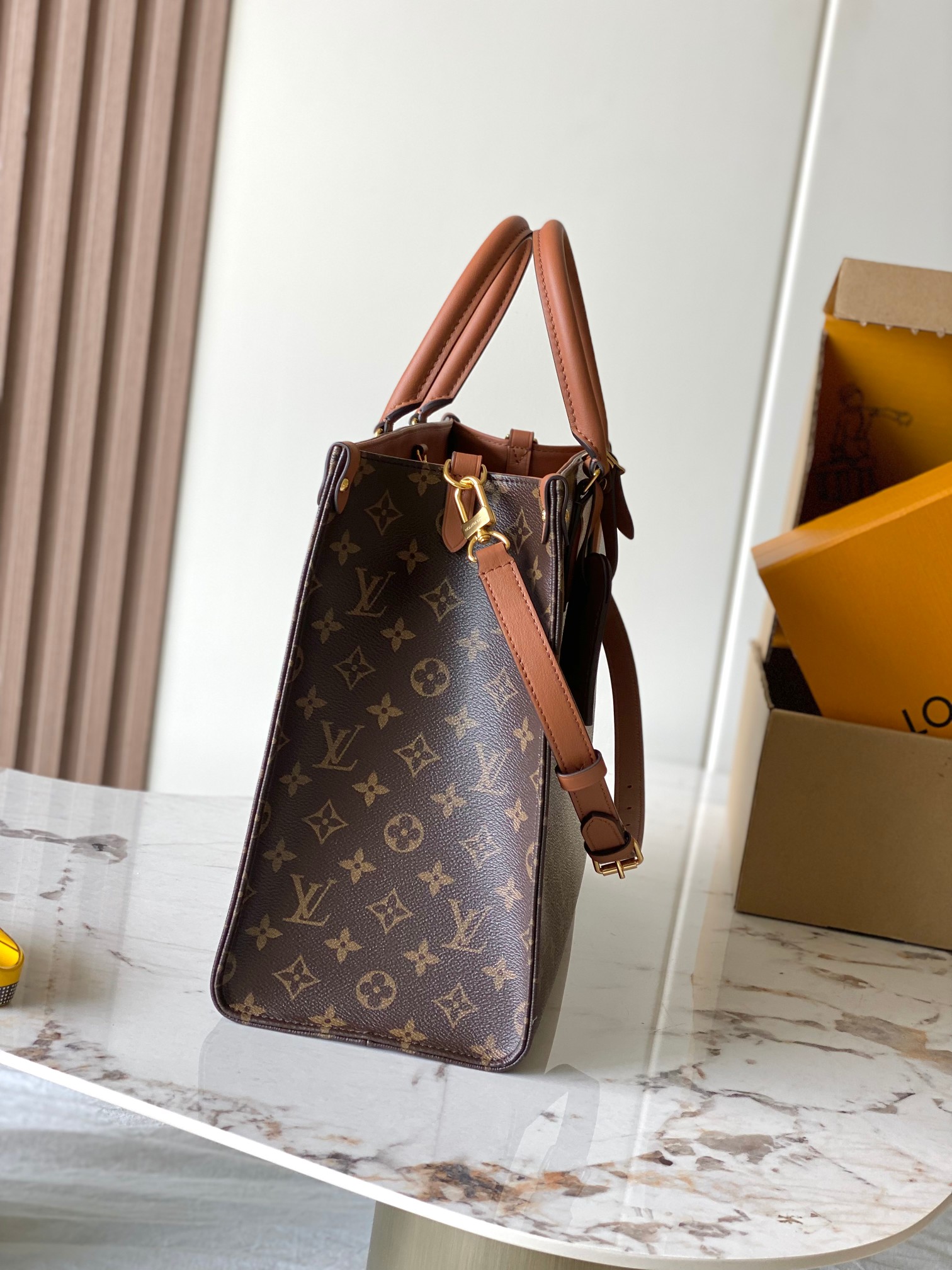 Louis Vuitton OntheGo Hand Bag