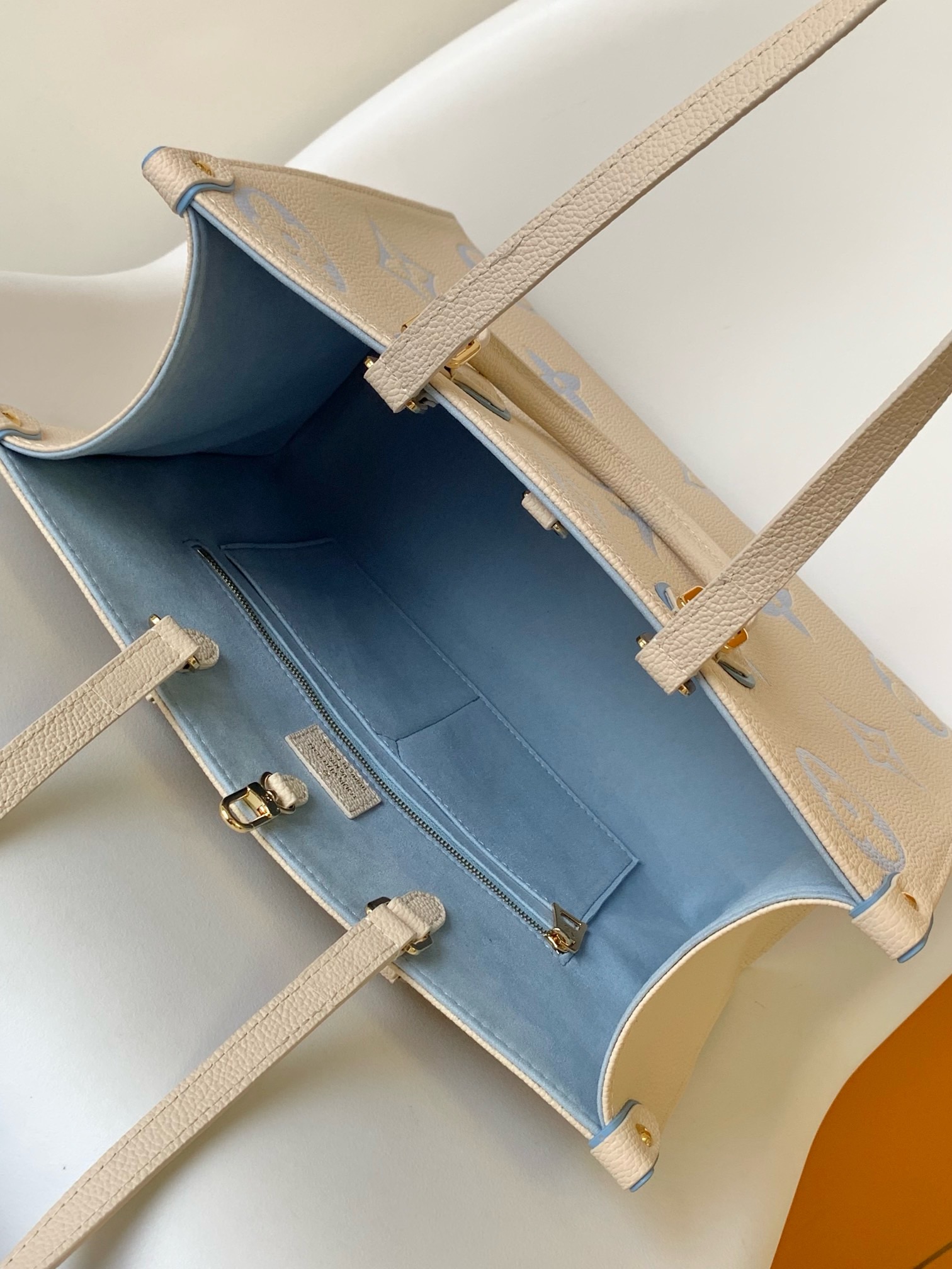 Louis Vuitton OnTheGo MM handbag.