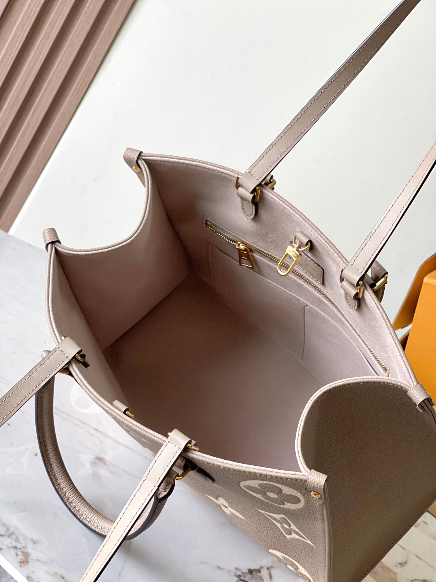 LOUIS VUITTON OnTheGo MM Leather Bicolor Monogram Empreinte Bag Gray