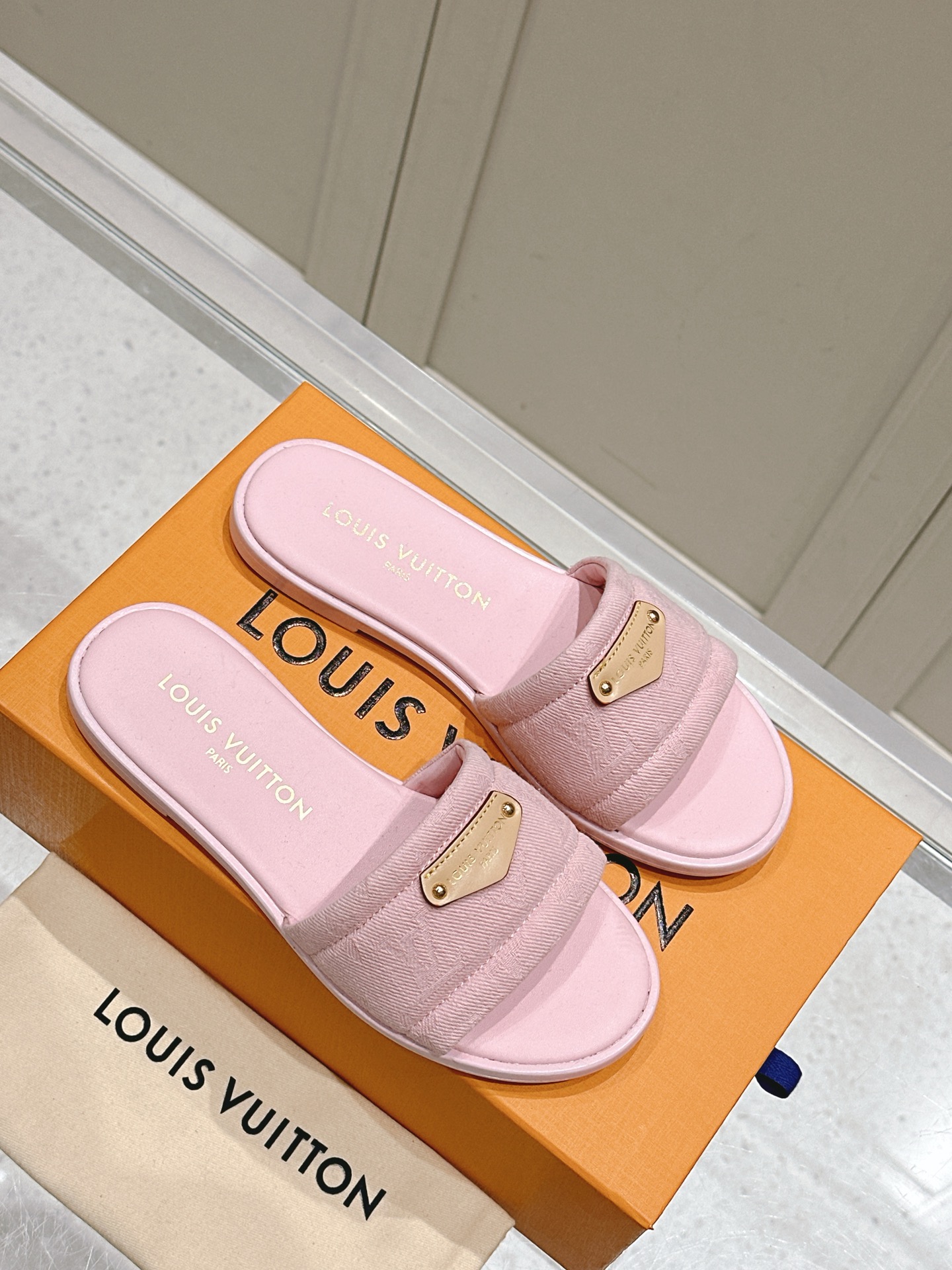 Louis Vuitton Pink Slide Sandals with Gold Buckle and Monogram Strap