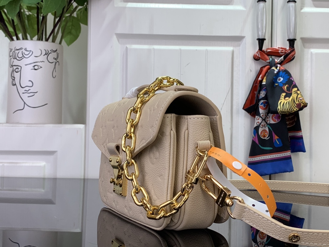 Louis Vuitton Pochette Métis East West Monogram Empreinte Leather