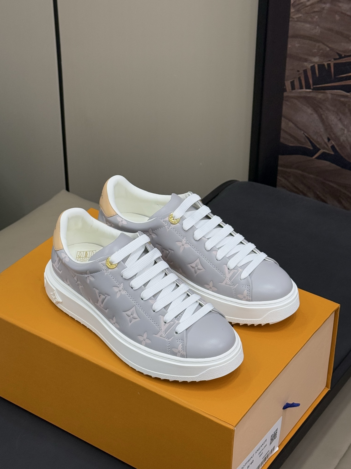 Louis Vuitton Time Out Monogram Embossed Leather Sneakers White Grey