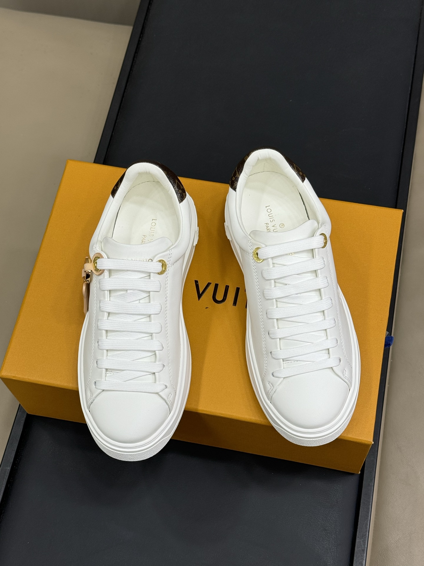 Louis Vuitton White Monogram Embossed Sneakers With Dog Charm