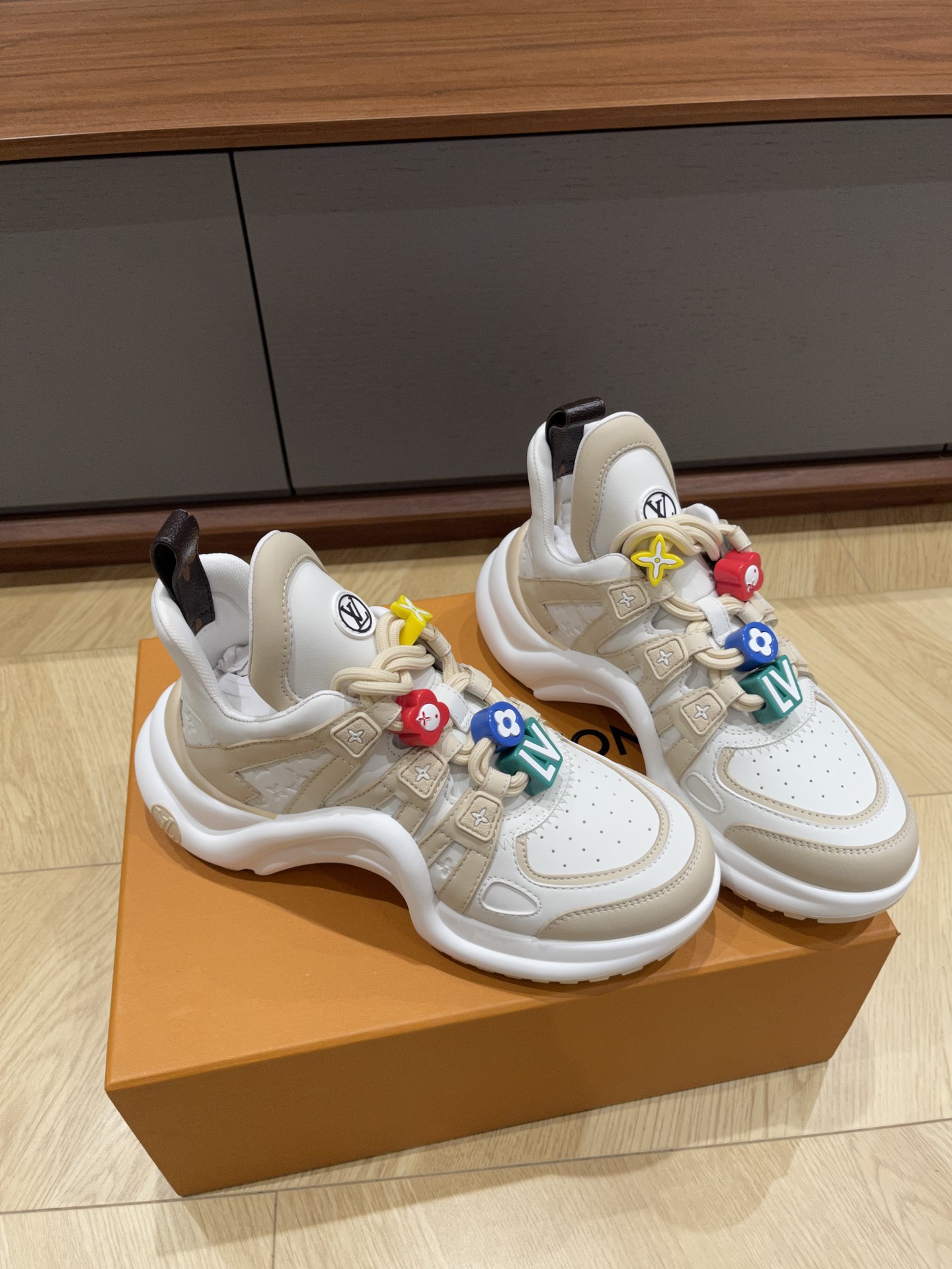 Louis Vuitton white trainer sneakers with colorful charms for women