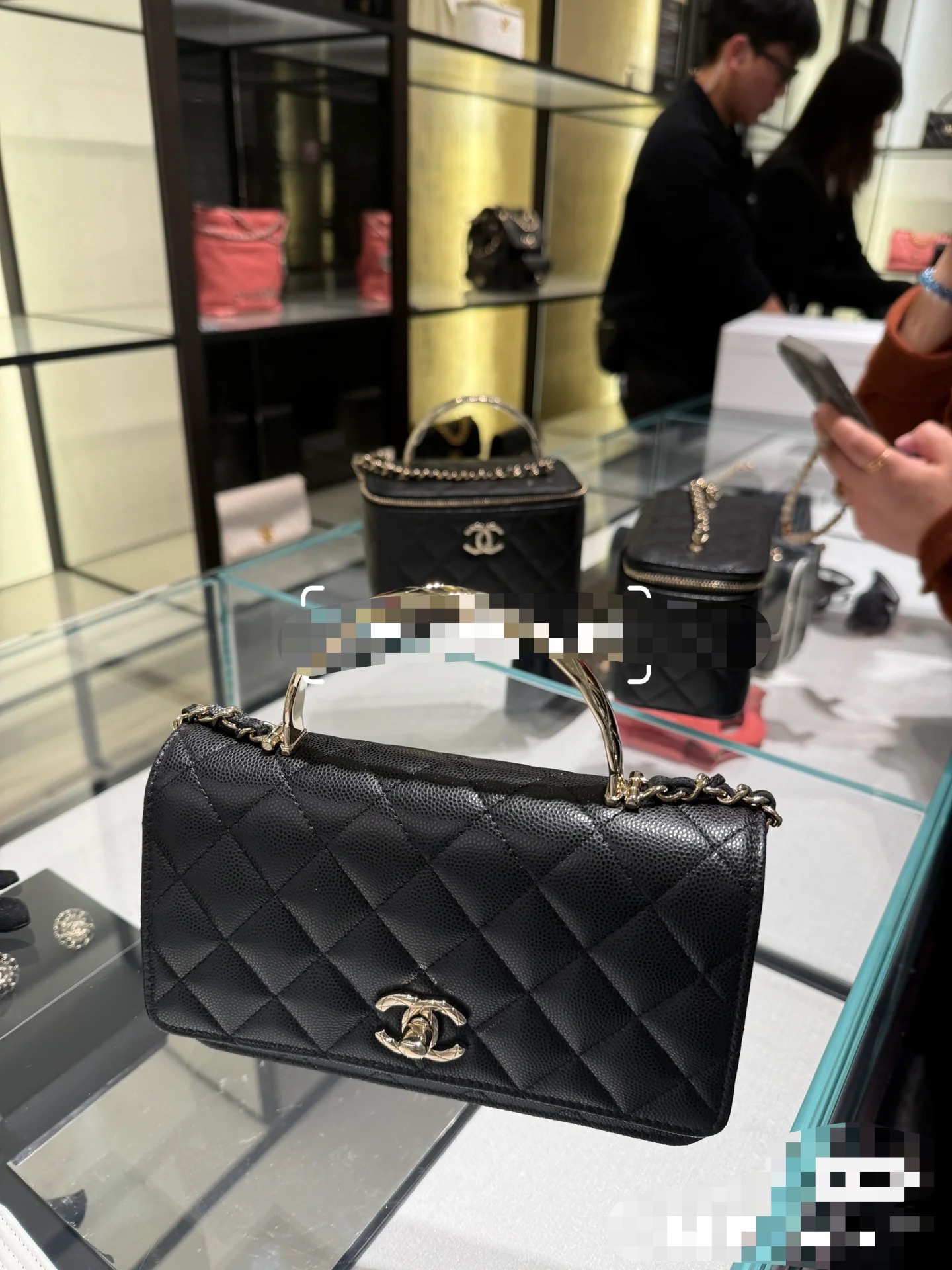 Maxi flap bag with top handle, Grained calfskin & gold-tone metal, black — Fashion