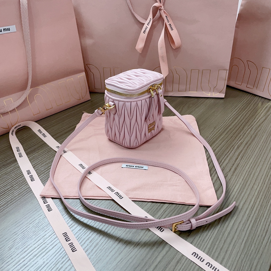 Miu Miu Alabaster Pink Matelassé Nappa Leather Micro Bag in pink | Miu Miu