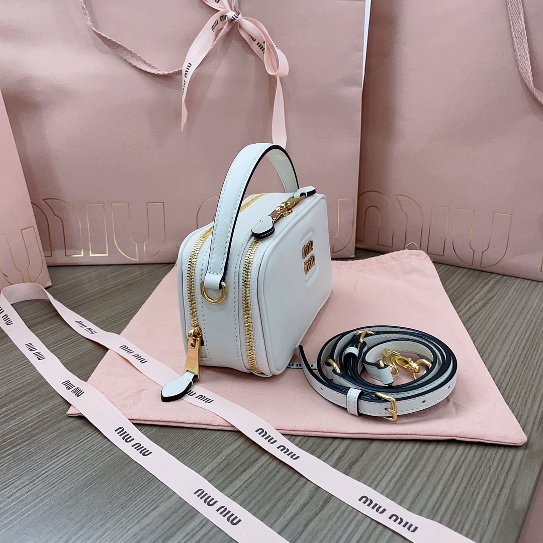 Miu Miu Handbags in Metallic | white Miu Miu