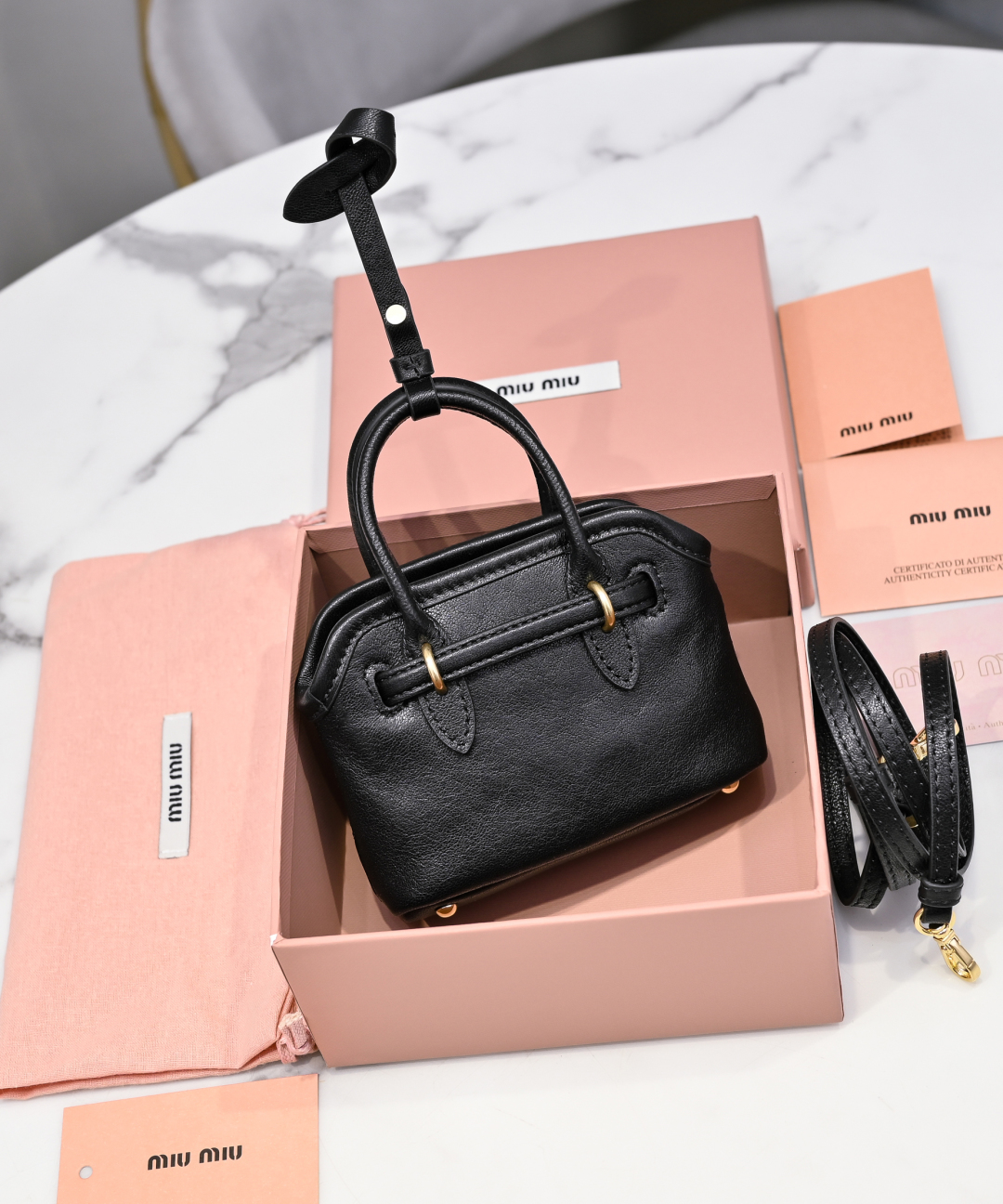 Miu Miu logo-lettering leather bag charm | Brown  Miu Miu 00099