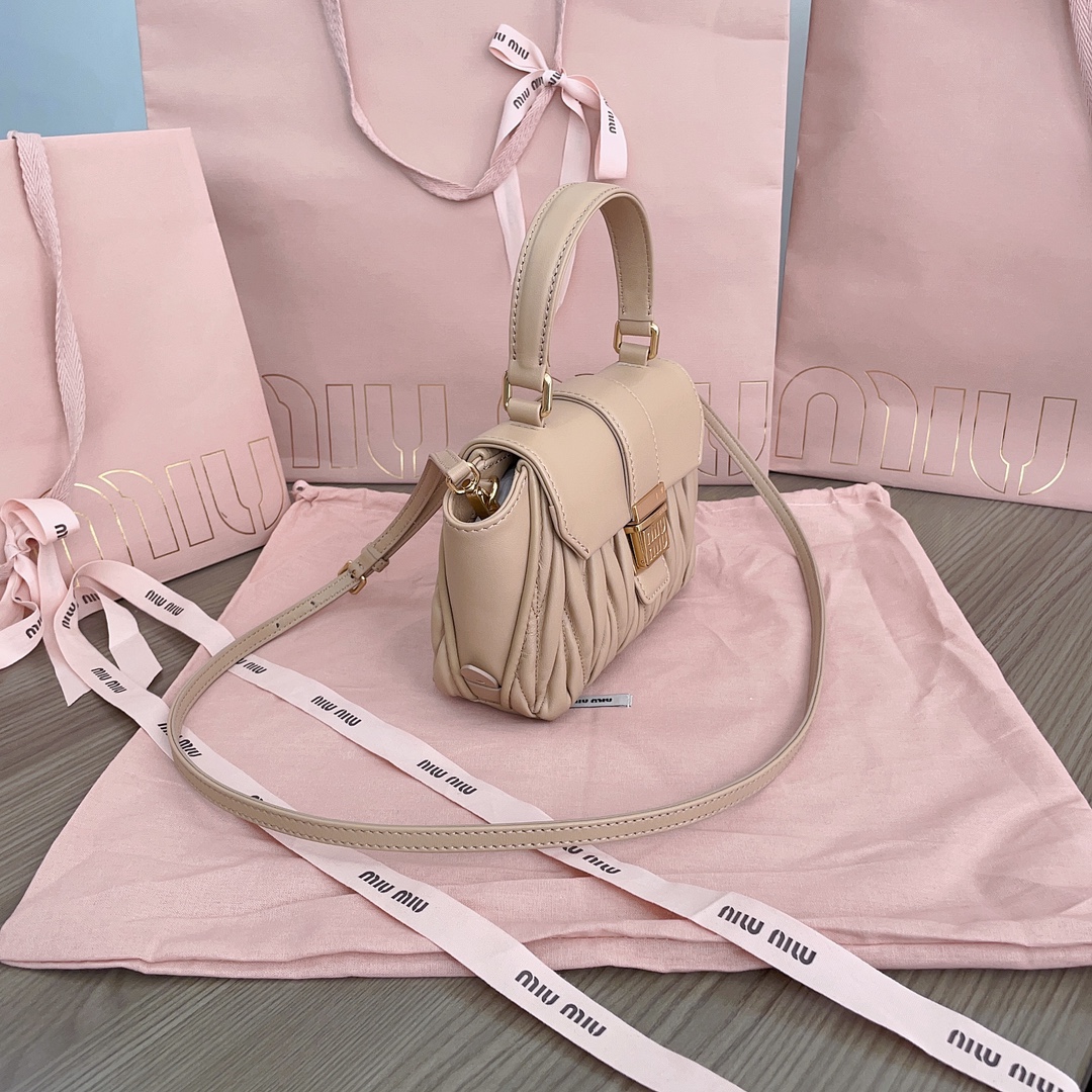 Miu Miu Matelassé top handle bag for Women - Beige in U