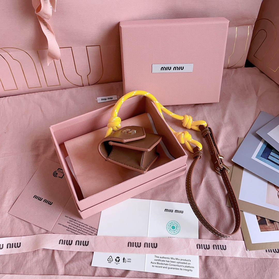 Miu Miu Mini-pouch leather, cord, and metal trick for Women