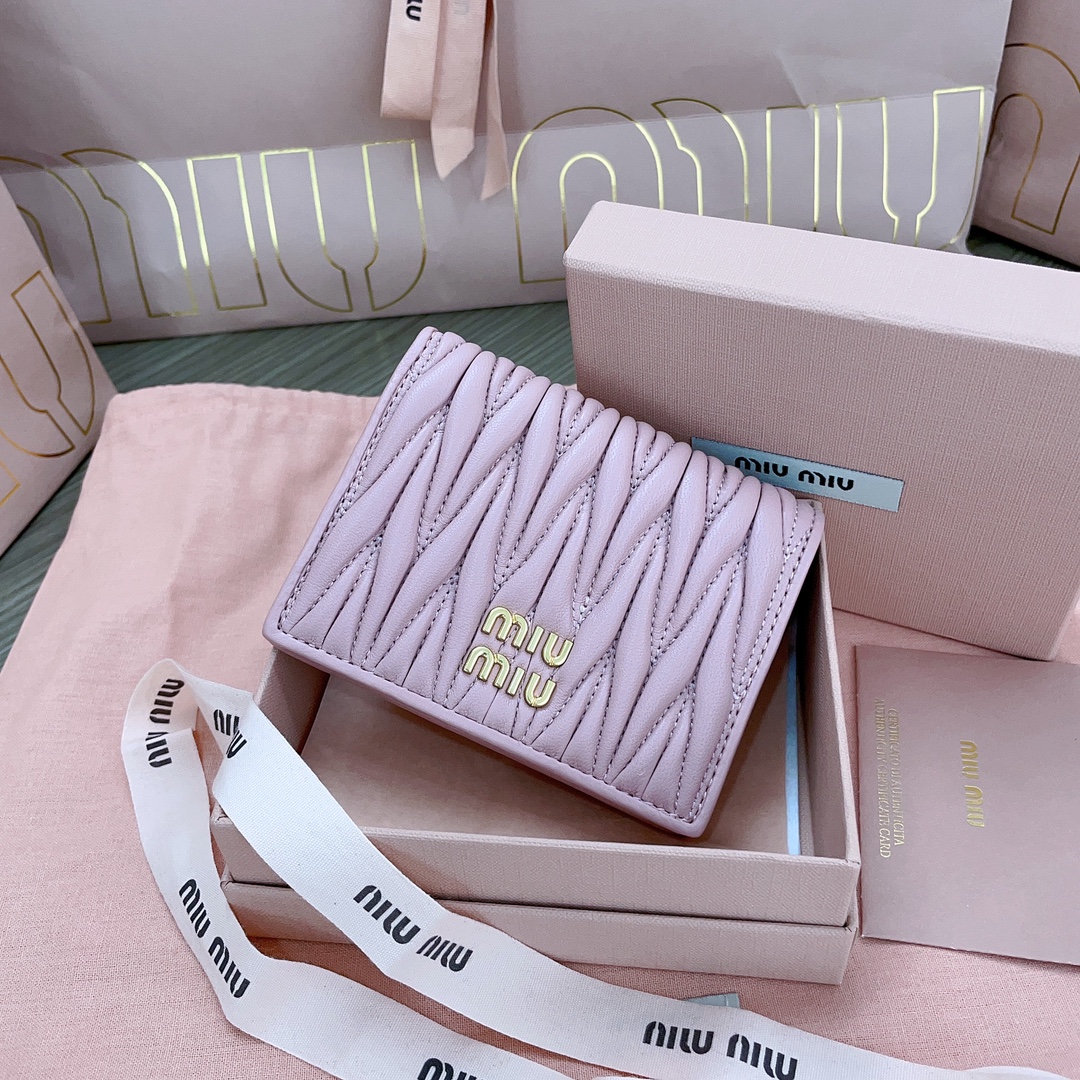 Miu Miu Small matelassé nappa leather wallet color  purple