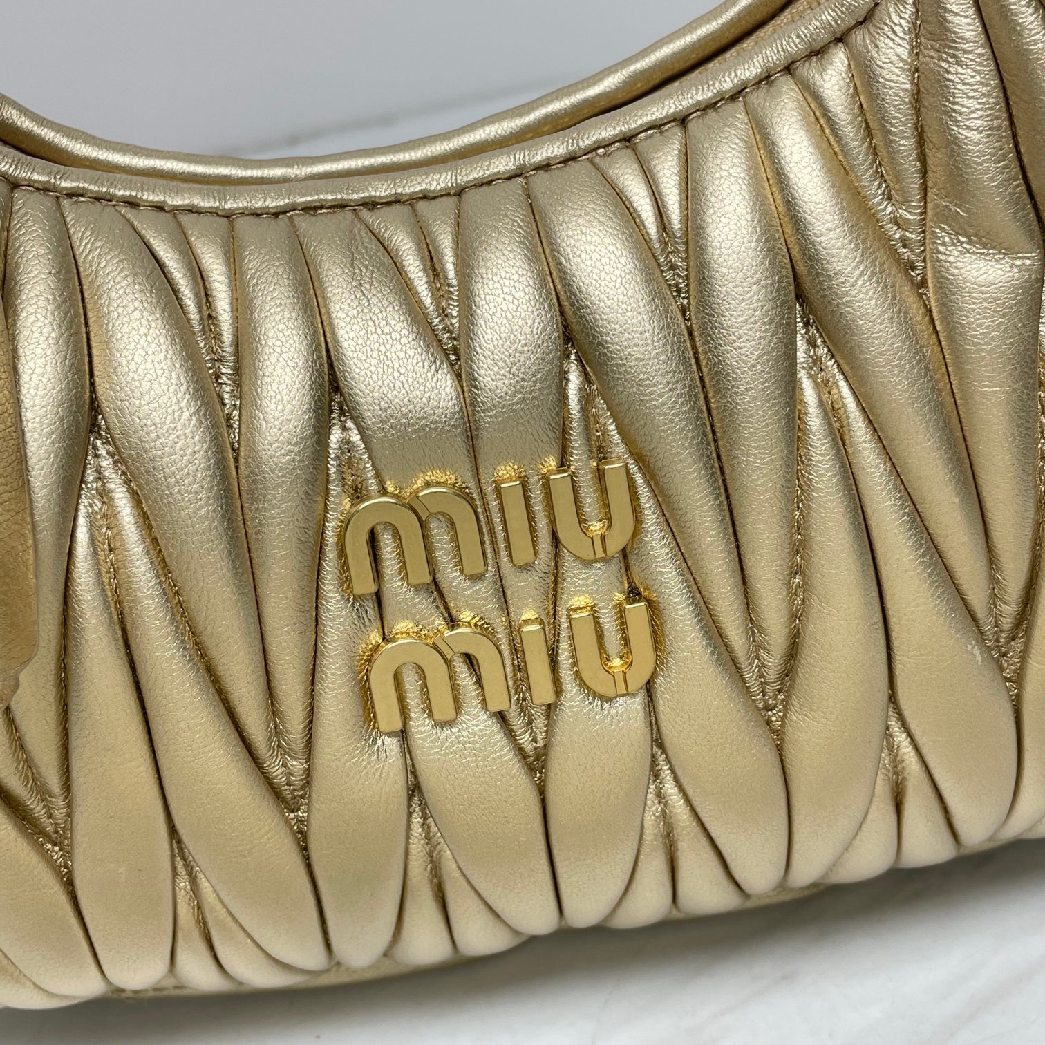 MIU MIU - Wander mini matelassé bag gold nappa-leather hobo