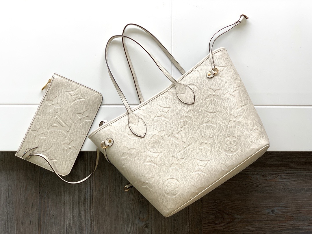 Neverfull MM Monogram Empreinte Bag White – Bag | LOUIS VUITTON In stock