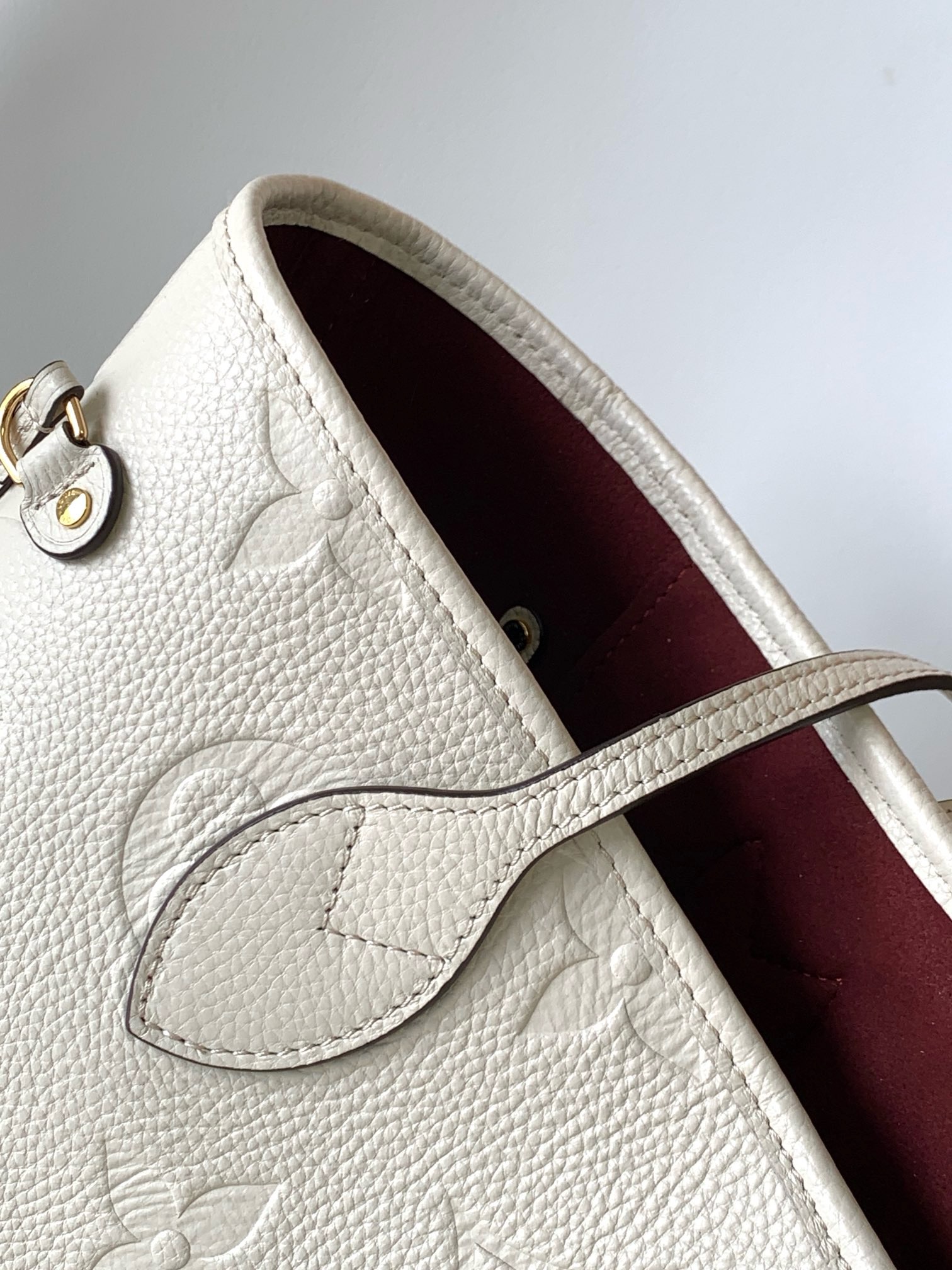 Neverfull MM Monogram Empreinte Bag White – Bag | LOUIS VUITTON In stock