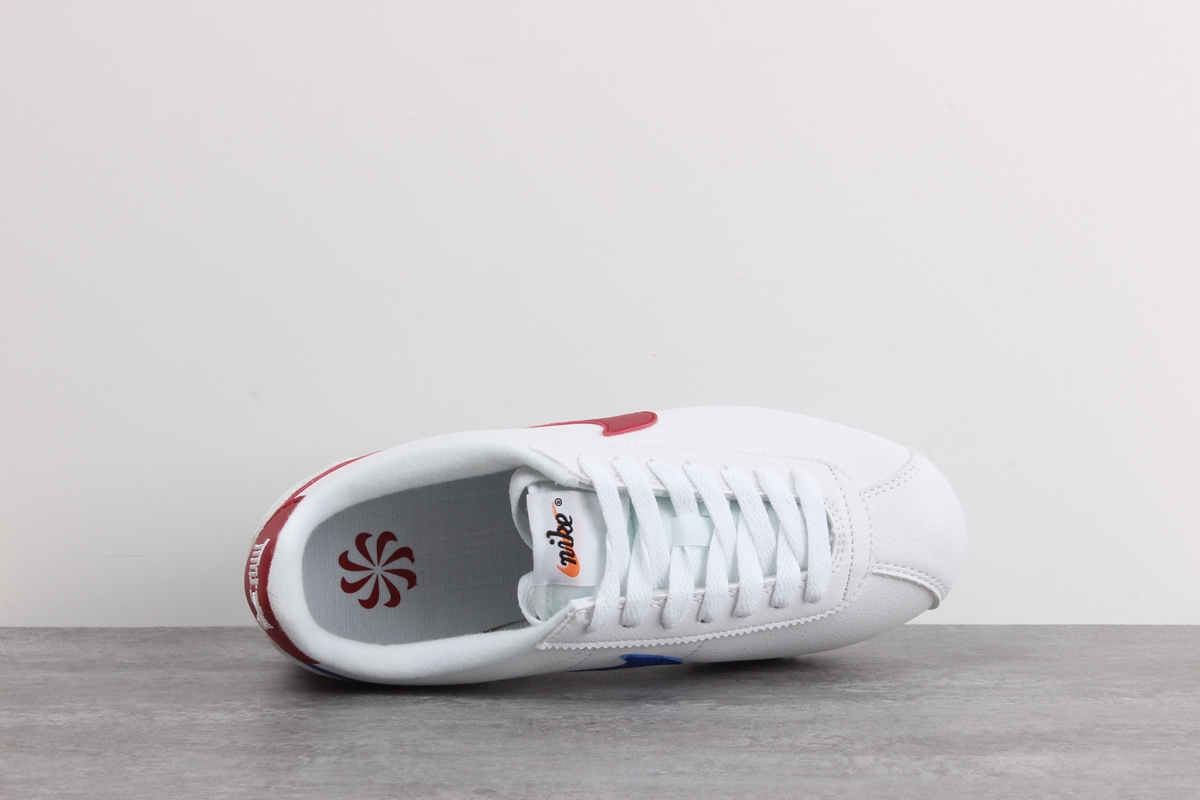Nike Cortez leather trainers in white with red swoosh