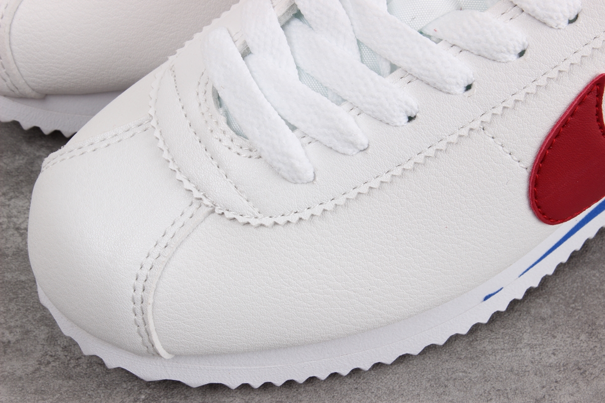 Nike Cortez leather trainers in white with red swoosh