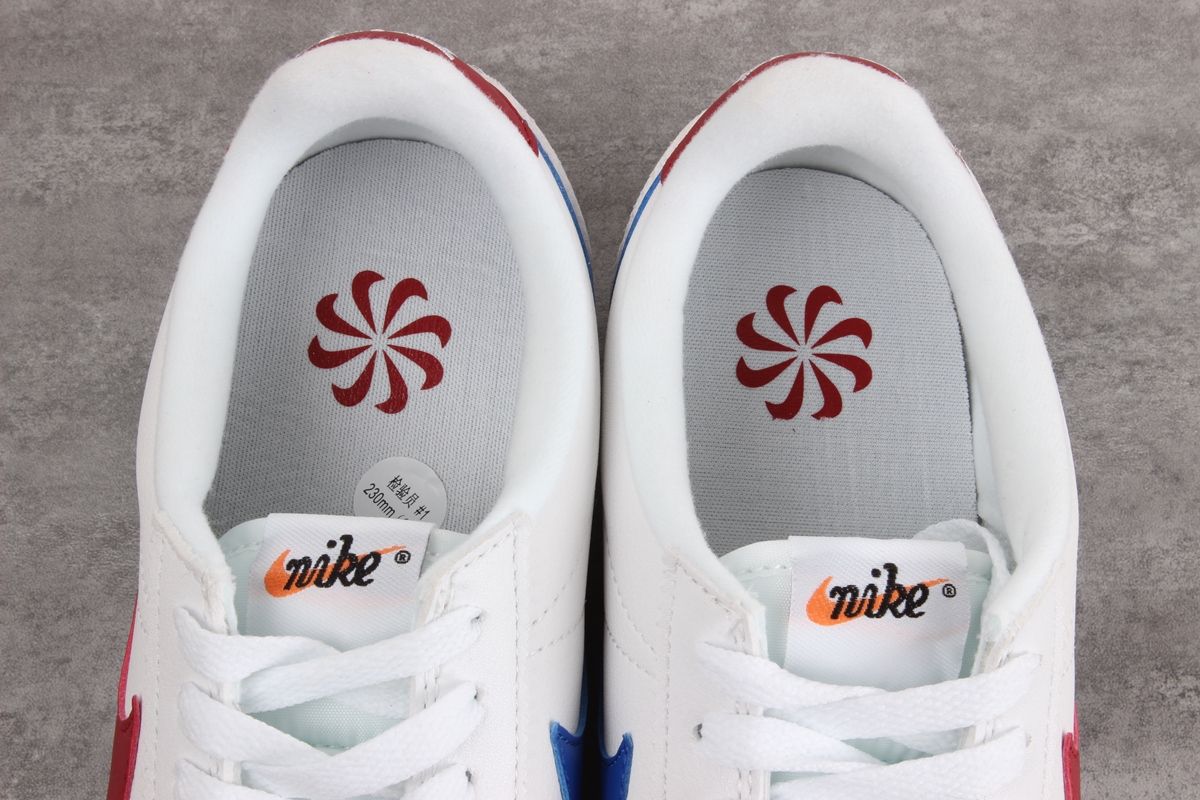 Nike Cortez leather trainers in white with red swoosh