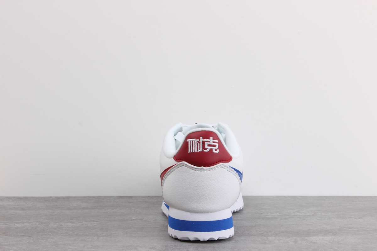 Nike Cortez leather trainers in white with red swoosh