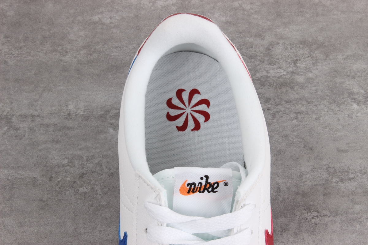 Nike Cortez leather trainers in white with red swoosh