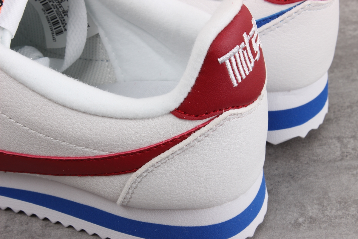 Nike Cortez leather trainers in white with red swoosh