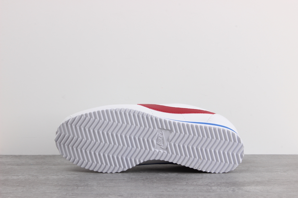 Nike Cortez leather trainers in white with red swoosh