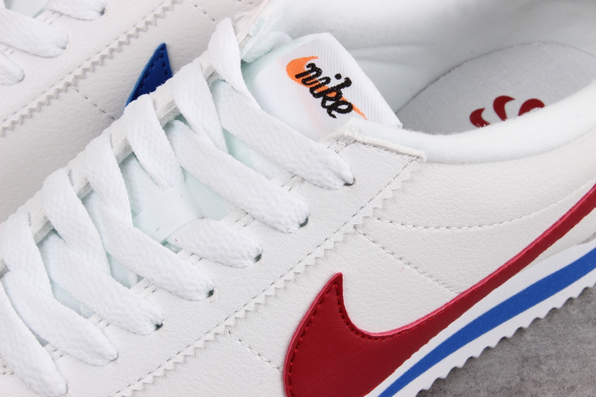 Nike Cortez leather trainers in white with red swoosh
