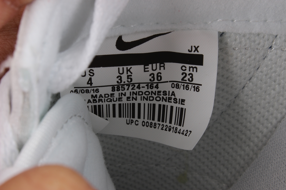 Nike Cortez leather trainers in white with red swoosh