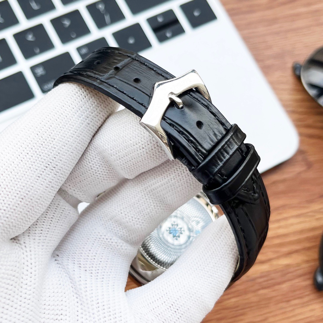 Patek Philippe men’s watch with open-heart movement and black leather strap dia black