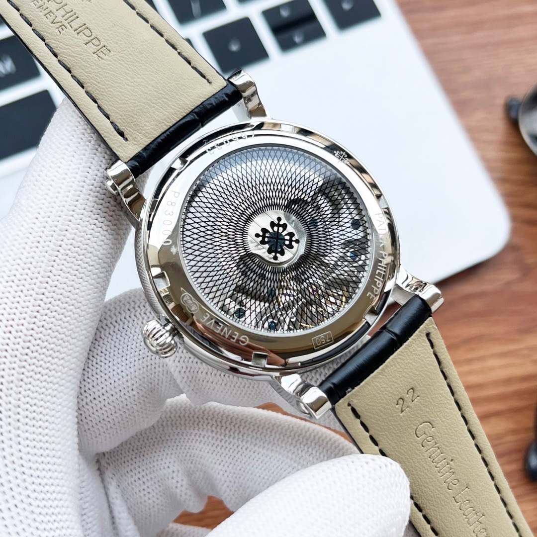 Patek Philippe men’s watch with open-heart movement and black leather strap dia black