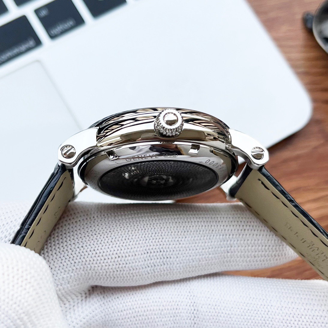 Patek Philippe men’s watch with open-heart movement and black leather strap dia black