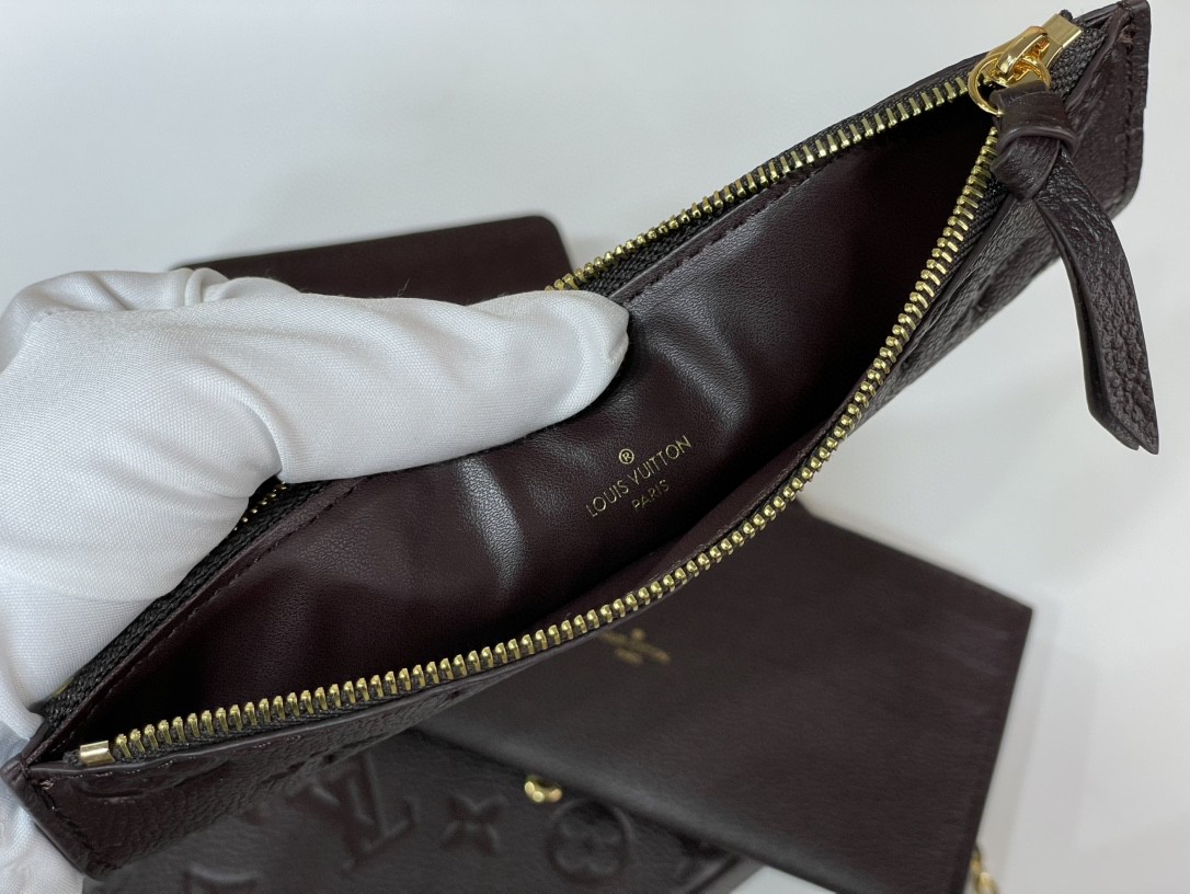 Pochette Félicie Monogram Empreinte Leather - Women -Louis Vuitton